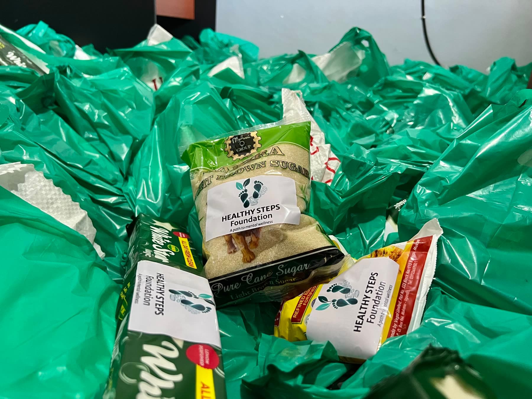 Food packages branded with the Healthy Steps Foundation logo